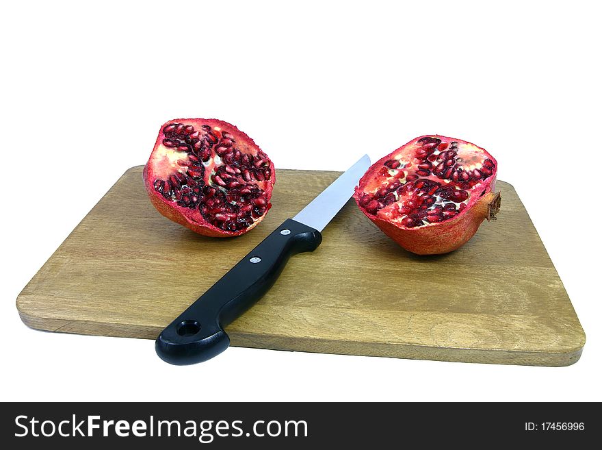 Pomegranate is a delicious kind of apple which is here cut in half
