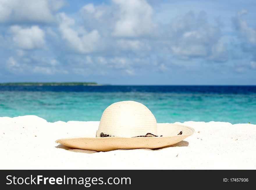 Sun hat o the sand in Maldives. Sun hat o the sand in Maldives