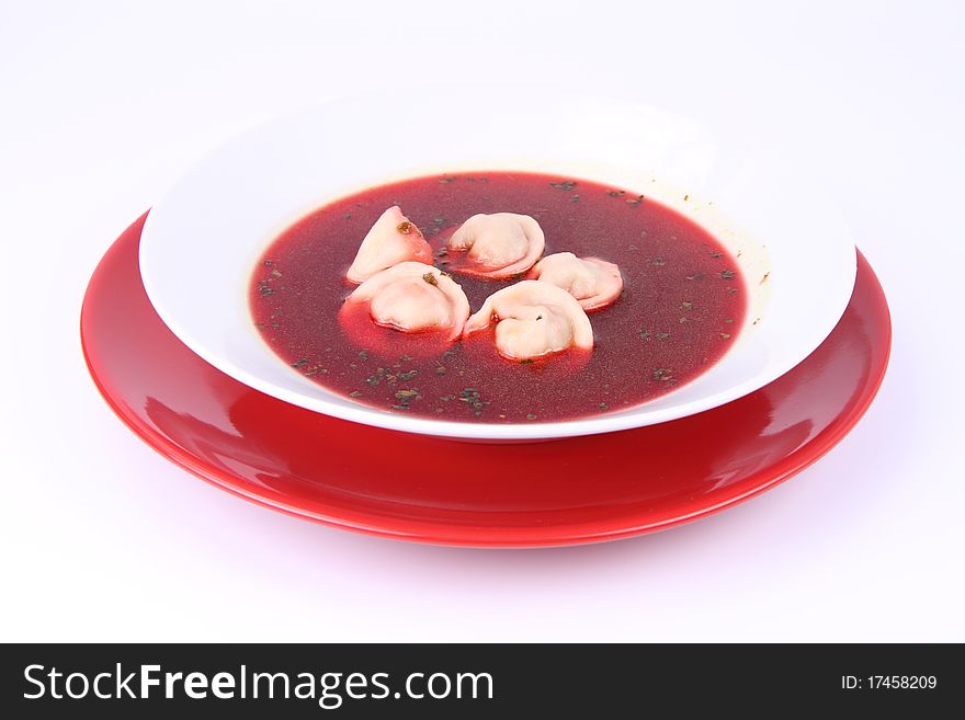 Traditional polish Christmas Eve dish: clear borscht with uszka (a mushroom filled kind of dumplings). Traditional polish Christmas Eve dish: clear borscht with uszka (a mushroom filled kind of dumplings)