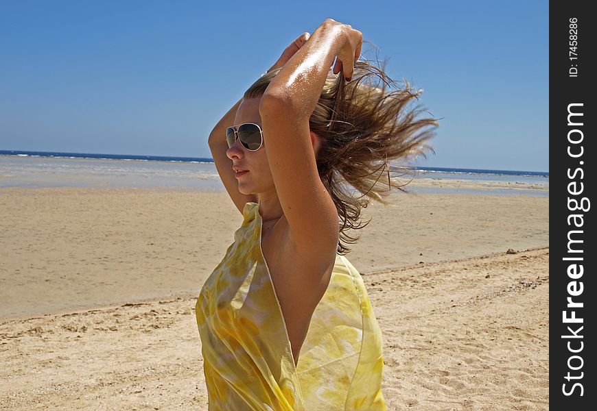 The Young Girl On A Beach