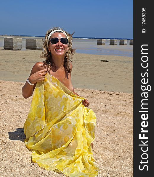 The Young Girl On A Beach