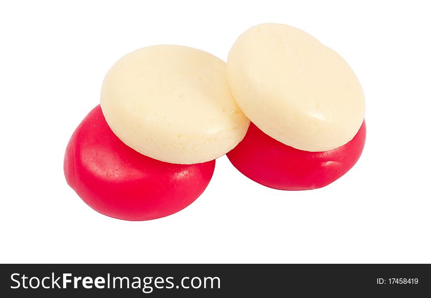 Round delicious cheese on a white background