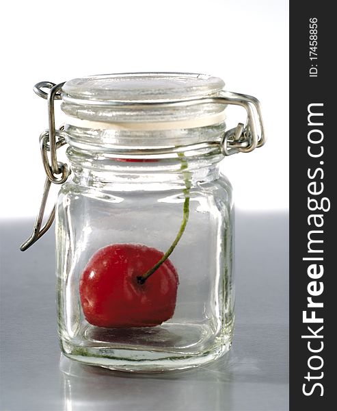 Enclosed in a sealed jar cherry