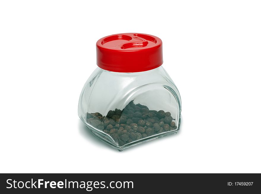 Pepper shaker with pepper on a white background