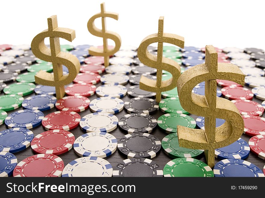 Multi - colored gambling chips and US dollar sign on a background. Multi - colored gambling chips and US dollar sign on a background