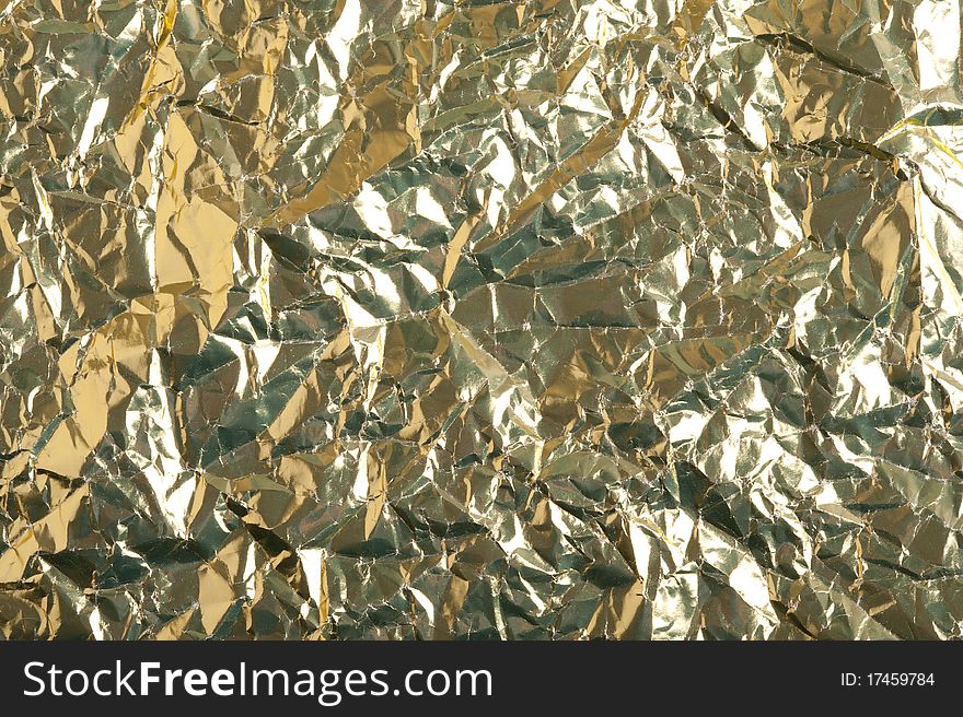 Gold background with metallic foil. Gold background with metallic foil