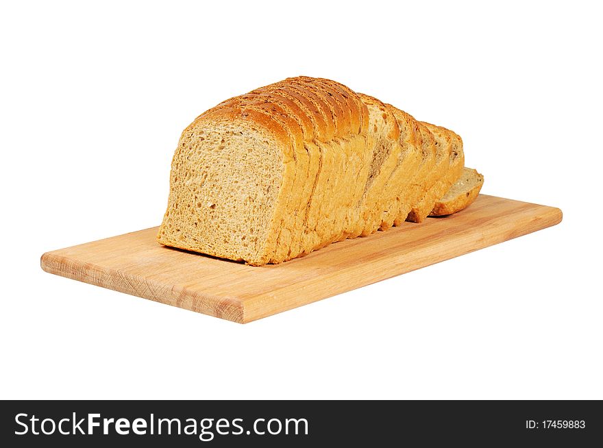 Sliced bread on wooden board