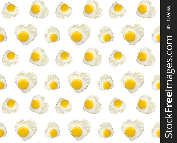 Heart shaped fried egg on white background closeup seamless pattern for design decoration.