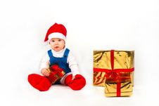 Little Boy In Santa Hat With A Bunch Of Gifts Royalty Free Stock Photos Little Boy In Santa Hat With A Bunch Of Gifts Royalty Free Stock Photos