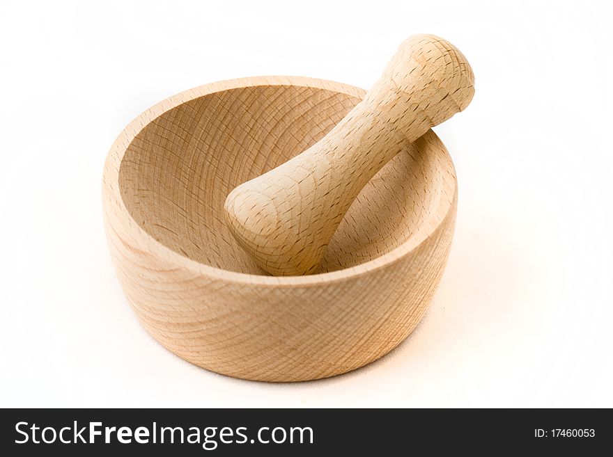 Wooden pounder isolated on a white background