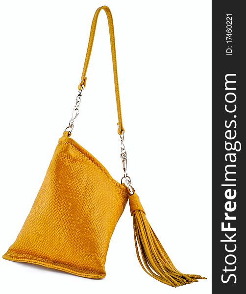 Yellow ladies handbag isolated on a white background