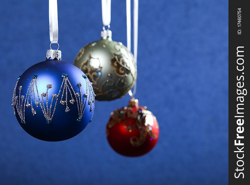 Christmas decoration color balls at blue background. Christmas decoration color balls at blue background