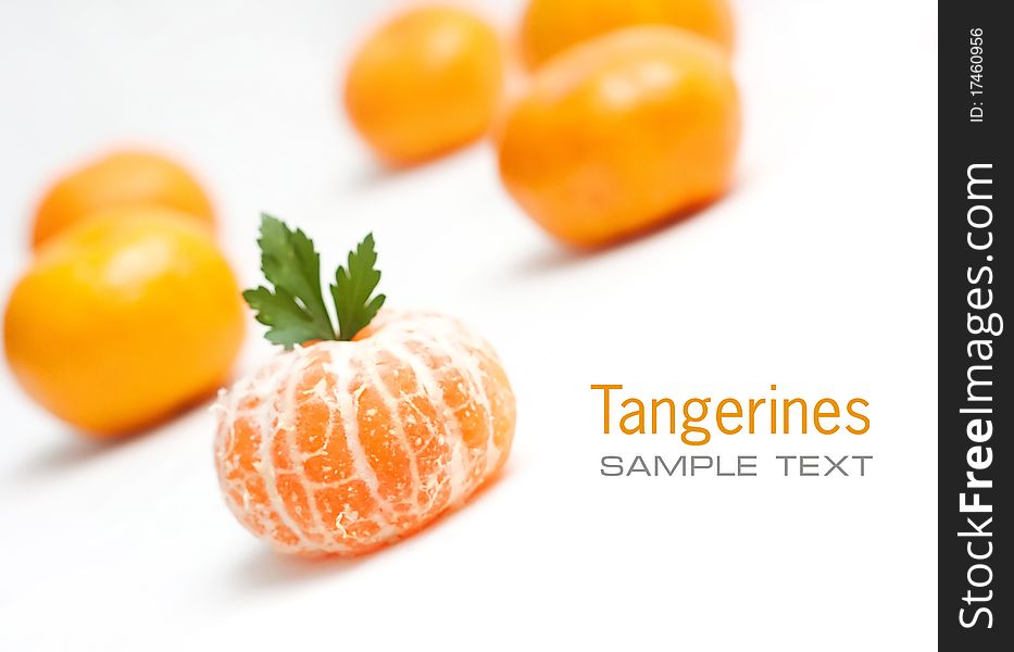 Fresh tangerines on white background