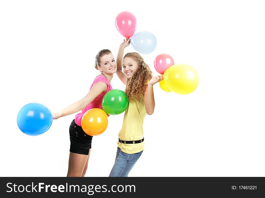 Smiling Girls With Balloons Over White