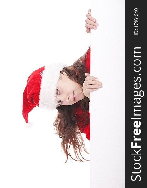 Girl dressed as santa claus holds advertisement