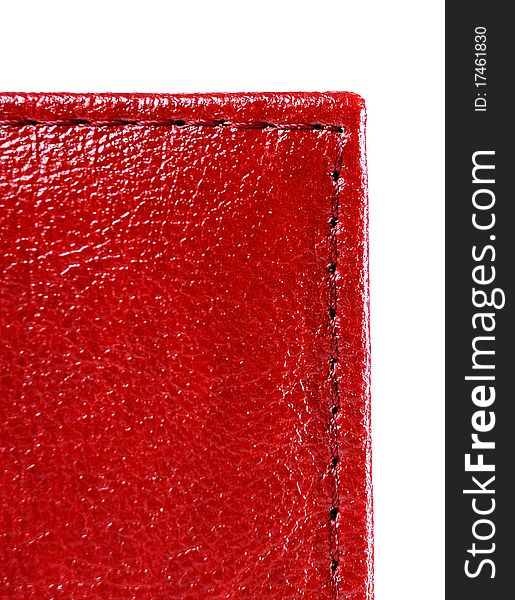 Red leather with stitch on a white background