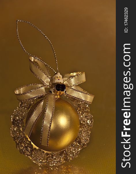 Image of a santa on golden christmas decoration ball. Image of a santa on golden christmas decoration ball