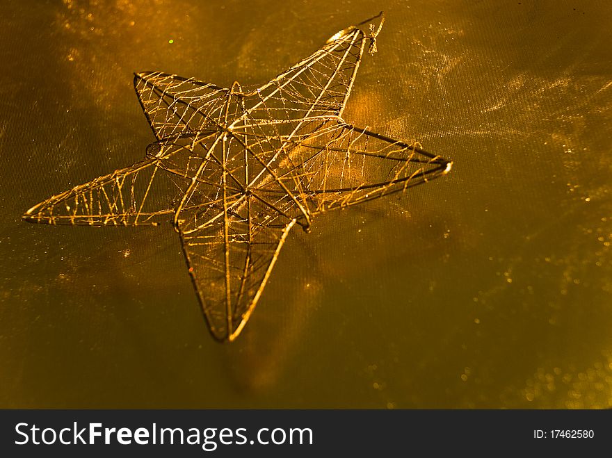 Golden christmas snowflake star decoration