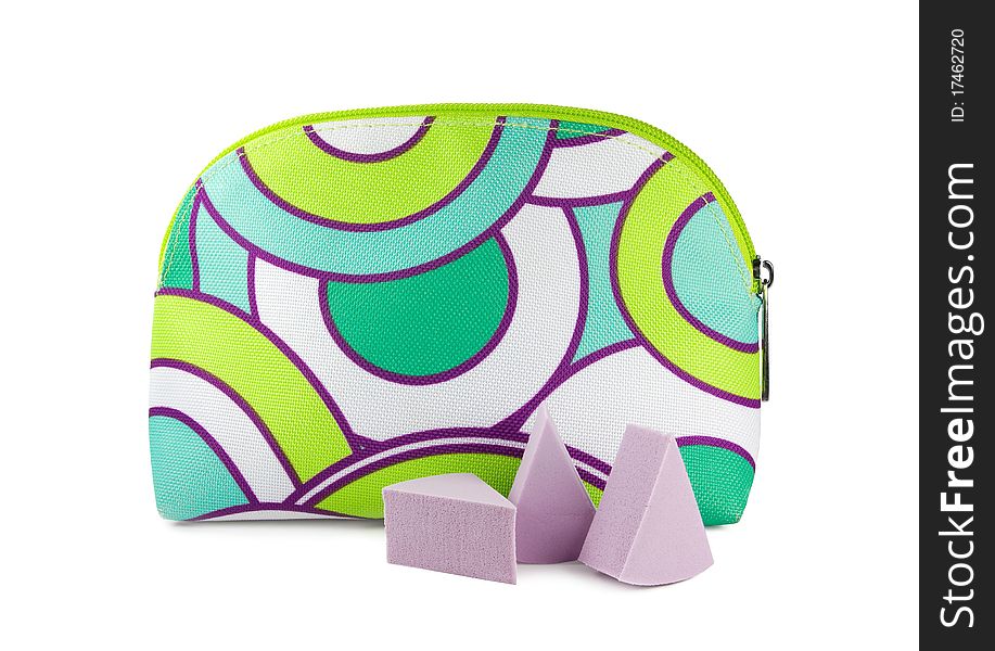 Cosmetic bag and three sponges isolated on white