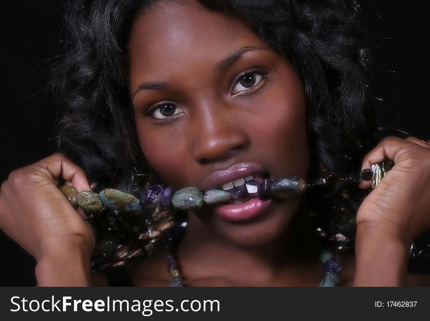 A sexy African American woman with jewelry. A sexy African American woman with jewelry
