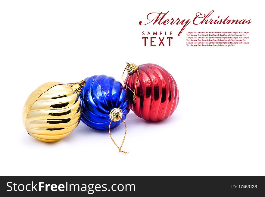 Red and blue christmas blubs on white background with copy space