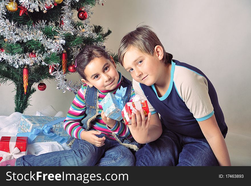Kids And Christmas Present