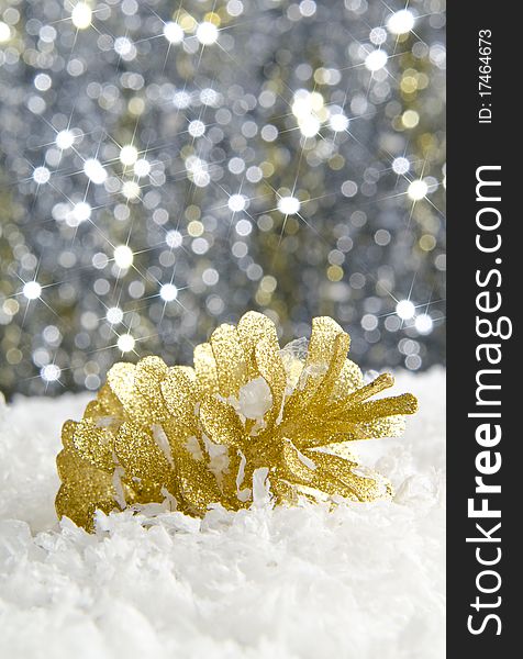 Golden Christmas decorations against a sparkling background