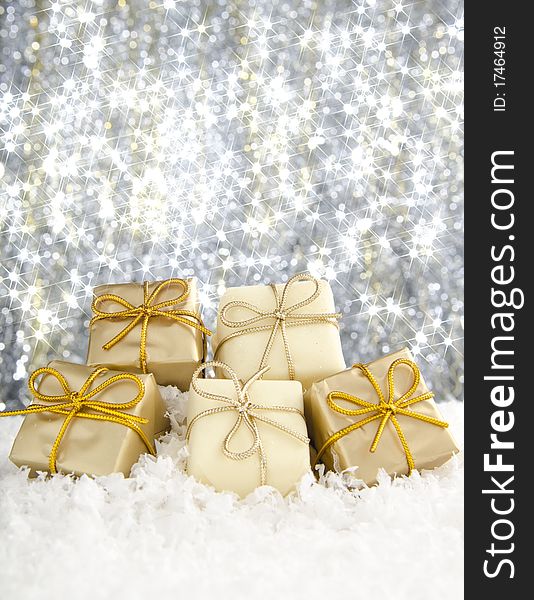 Golden Christmas decorations against a sparkling background