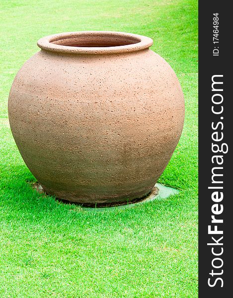 Clay Pot With Grass Background
