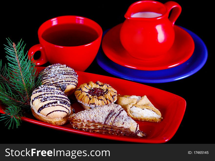 A tray of tea with milk, sugar and biscuits. A tray of tea with milk, sugar and biscuits