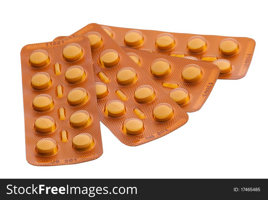 Group of three orange tablet blisters isolated at 15Mps. Group of three orange tablet blisters isolated at 15Mps