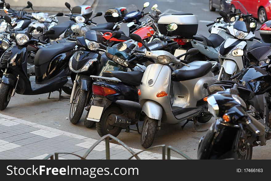 Parked Motor Scooters in Spain