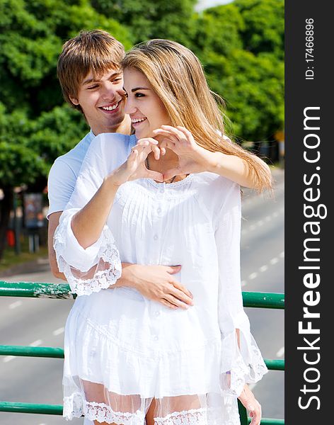 Portrait young happy couple outdoor