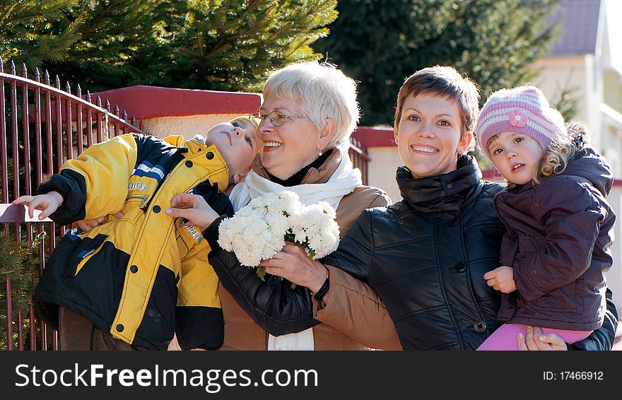 Portrait happy family outdoor in street