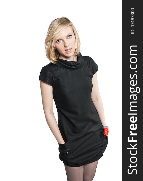 Young attractive woman in black dress. Studio photo of blonde woman on white background.
