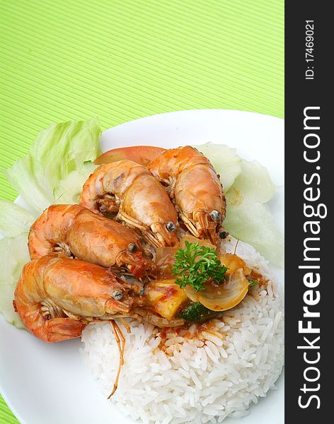 White rice with hot and spicy shrimps. White rice with hot and spicy shrimps