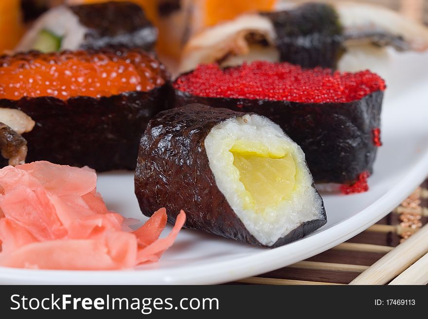 Traditional japanese sushi and rolls close up. Traditional japanese sushi and rolls close up