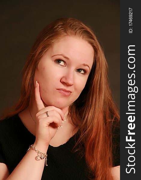 Portrait of a young woman, Studio. Part of a grimace series, same model, different emotions. Portrait of a young woman, Studio. Part of a grimace series, same model, different emotions.