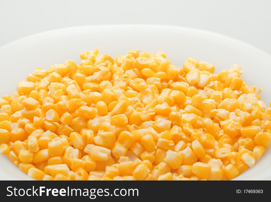 Stack of sweetcorn kernels in a white bowl