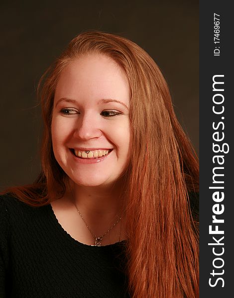 Portrait of a young woman, Studio. Part of a grimace series, same model, different emotions. Portrait of a young woman, Studio. Part of a grimace series, same model, different emotions.