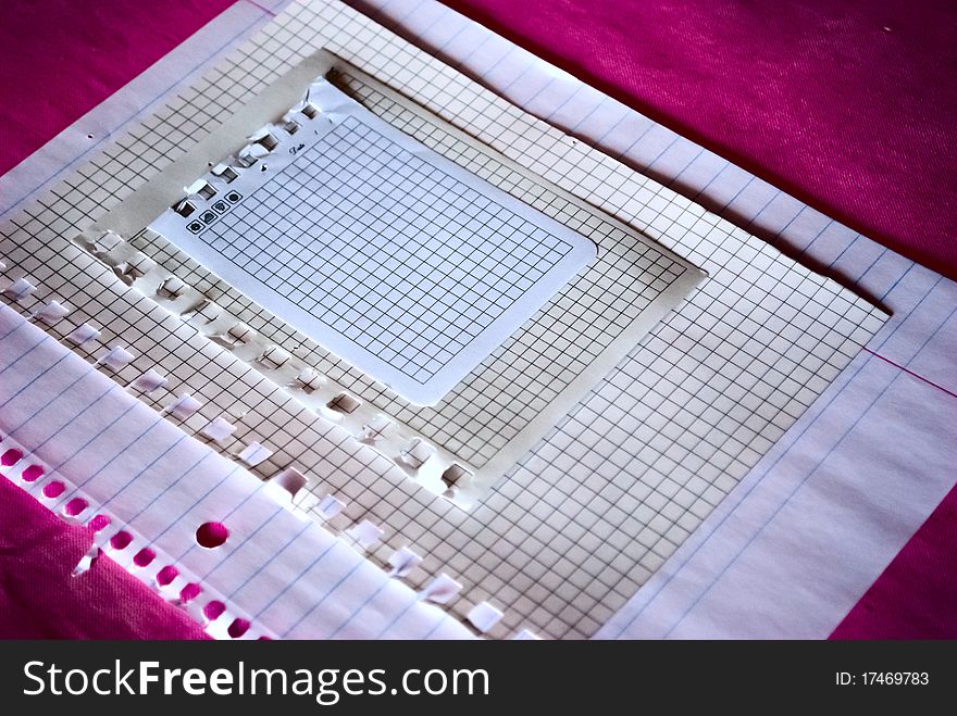 Blank paper is folded neatly on a pink background. Blank paper is folded neatly on a pink background