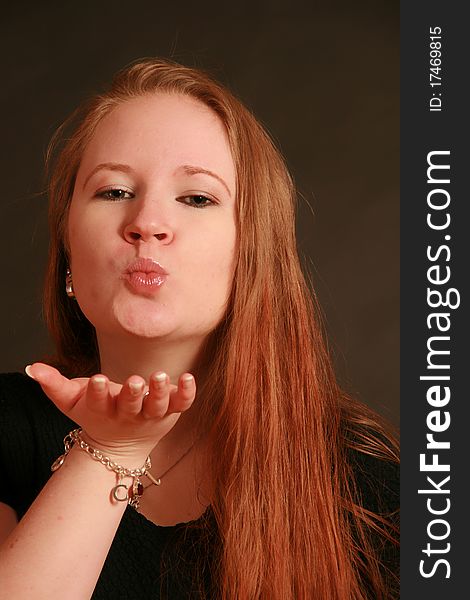 Portrait of a young woman, Studio. Part of a grimace series, same model, different emotions. Portrait of a young woman, Studio. Part of a grimace series, same model, different emotions.