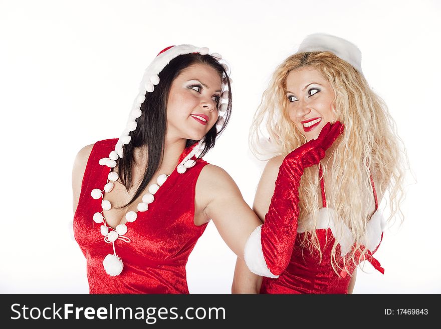Two sexy Santa girls having fun