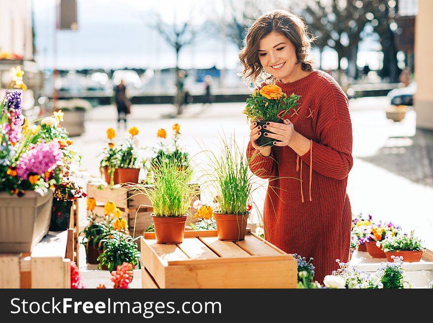 Woman buying flowers