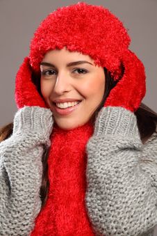 Happy Smile By Woman In Warm Festive Woolly Knits Stock Photography Happy Smile By Woman In Warm Festive Woolly Knits Stock Photography