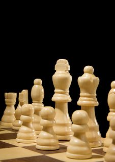 Chess Piece On Board Isolated On Black Stock Photos Chess Piece On Board Isolated On Black Stock Photos