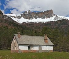 Hut And Snow-covered Mountains In Pyrenees Stock Photo Hut And Snow-covered Mountains In Pyrenees Stock Photo