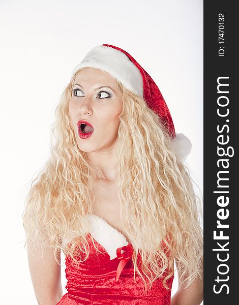 Sexy girl with blonde curly hair dressed as Santa