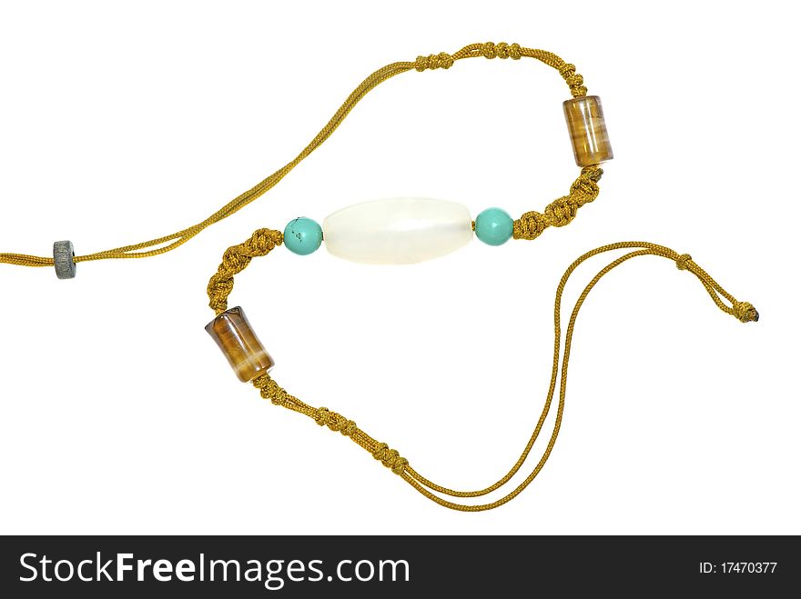 A chinese necklace on the white background