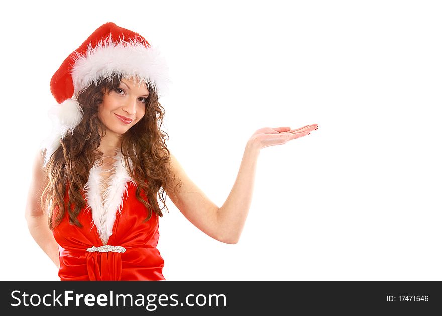 Woman in Santa Claus dress is looking on her hand. Isolated on white.